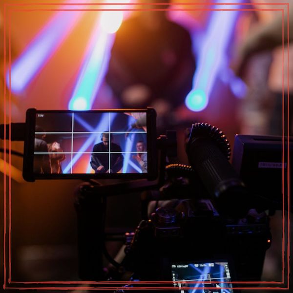 A video camera recording a live performance | Photo by Alena Darmel @a-darmel on Pexels.com | https://www.pexels.com/photo/a-video-recording-of-a-live-performance-7715618/