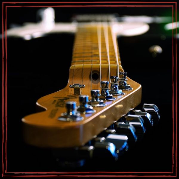 Close up photo of electric guitar | Image by @brett-sayles on pexels.com | https://www.pexels.com/photo/close-up-photo-of-electric-guitar-1205062/